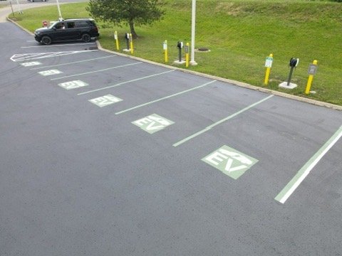 Freshly painted ADA parking spaces with professional pavement markings