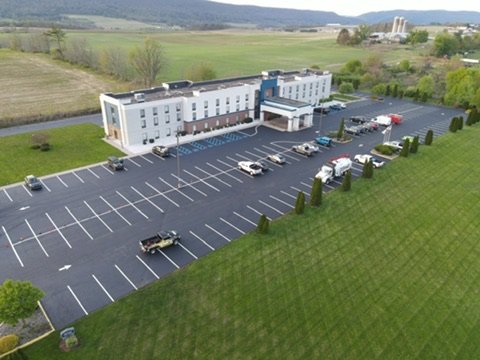 Office building parking lot with professionally painted parking spaces