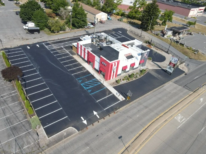 Retail shopping center parking lot with newly painted parking lines