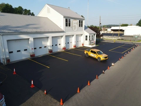 Commercial property with freshly cleared parking lot after snow removal
