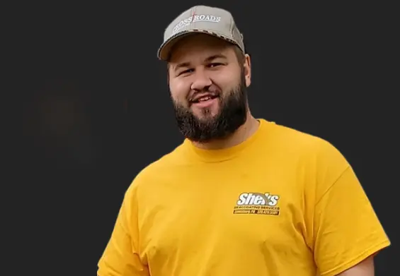 Professional asphalt sealcoating team member ready to serve customers