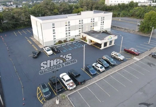 Completed commercial hotel parking lot paving and asphalt maintenance project